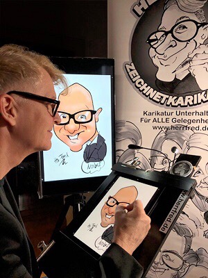 iPad Karikaturist Herr Fred ist Schnellzeichner digital